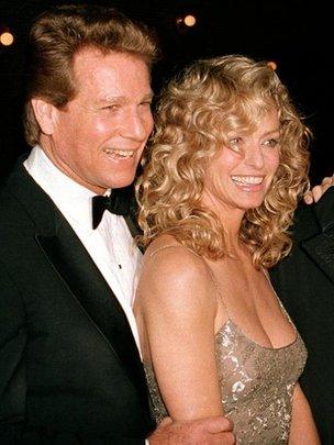 Ryan O'Neal, left, and Farrah Fawcett