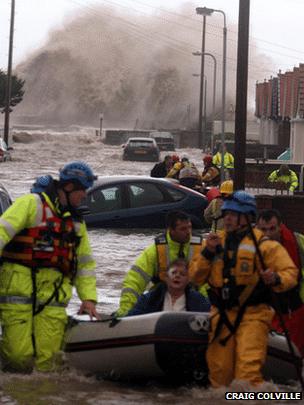 A pensioner being rescued in Rhyl