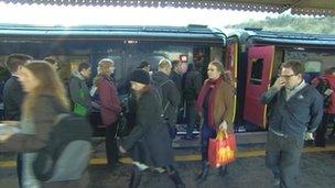 Commuters exit a First Great Western train