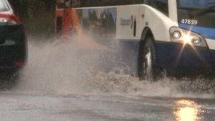 Bus going through flood water