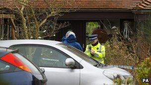 Police outside house in Smuggler's Lane, Bosham