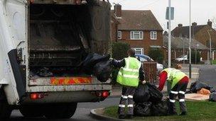 Bin men collecting rubbish