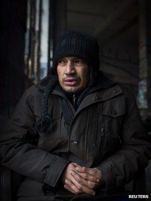 Bulgarian Roma man Dimitar Todorov sits in his squat in Berlin, 4 December 2013