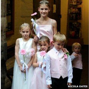 Thomas and family at a wedding