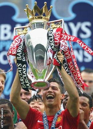 Cristiano Ronaldo lifts the Premier League trophy