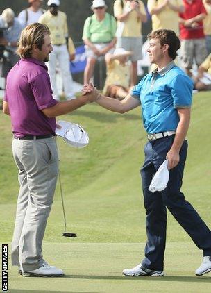 Tommy Fleetwood of England (right) and Victor Dubuisson of France during the final round of the 2014 Volvo Golf Champions at Durban Country Club on January 12, 2014 in Durban.