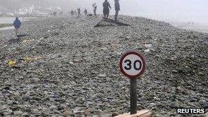 In Pembrokeshire, the main road at Newgale has been closed due to flooding - and this road sign looks lost