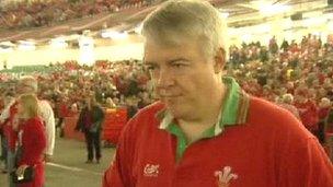 Carwyn Jones in a Wales rugby shirt