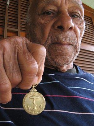 Argemiro dos Santos with a medal