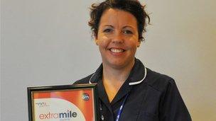 Heidi Morris with award