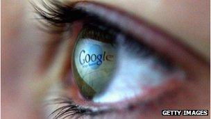 An eye with Google logo reflection