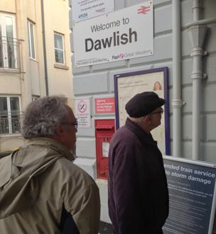 Would-be rail passengers at Dawlish station