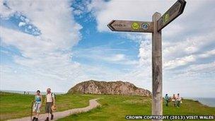 Visitors walking the coastal path