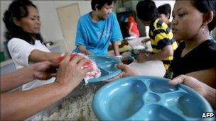 Indonesian women at a shelter for abused migrant maid workers in Kuala Lumpur, 2007 file image