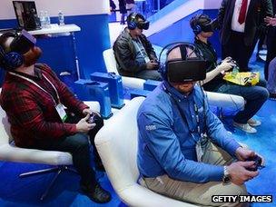 Gamers play with Oculus Rift