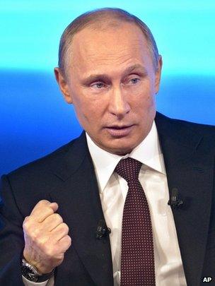 Russian President Vladimir Putin takes part in a TV show in Moscow, 17 April