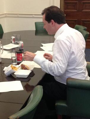 George Osborne eating a burger and chips