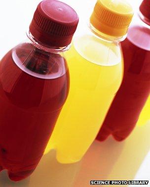 Plastic bottles containing brightly coloured drinks