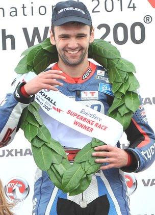 William Dunlop celebrates winning the opening Superbike race