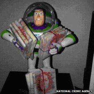 Buzz Lightyear model with money