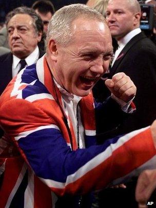 Maloney celebrating a Lennox Lewis victory