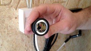 A DC cigarette lighter port used as a power socket