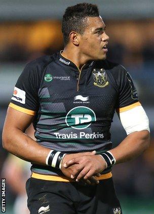 Luther Burrell holds his injured right hand