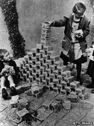 Children playing with worthless money in 1923 Germany