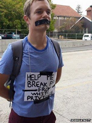 A student protests at UCT