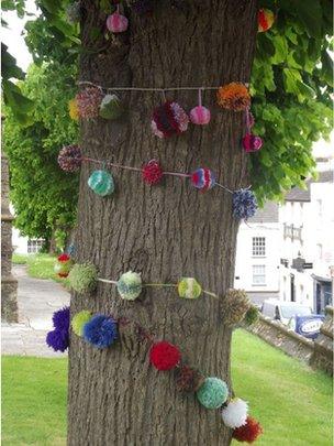 St John's Church tree covered in pom poms