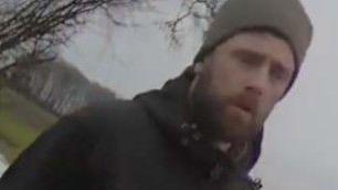 James Kent has a ginger beard and is wearing a grey beanie hat with a dark blue coat.
