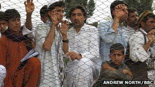 People watching a cricket match in Afghanistan