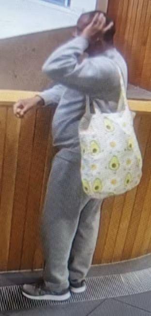 Hadush Kebatu is seen wearing a grey tracksuit holding a white bag with avocadoes.