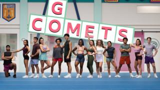 Image of a cheer squad posing on a mat in a gym hall with the words 'Go Comets' behind them in crossword format.