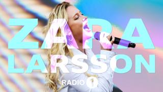Zara Larsson quiz, image of Zara performing a song with her name in front.