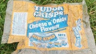 A close-up image of the 1978 cheese and onion crisp packet. The packet carries a promotion for toy cars.