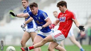 Cavan's Conor Moynagh and Cork's Tomas Clancy