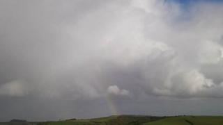 Shower cloud plus rainbow
