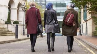 women wearing headscarves in street