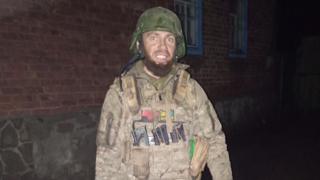 Vasyl pictured wearing his military uniform