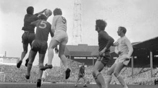 Peter Bonetti, one of the heroes of the 1970 FA Cup final, rises highest to claim the ball