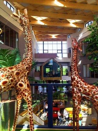 Models of giraffes at Moneypenny office