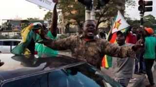 There were scenes of celebration on the streets of the capital, Harare.