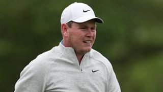 Robert MacIntyre at the Texas Open on Sunday in grey fleece top and white cap