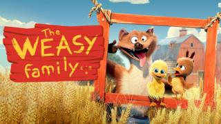 A weasel is pulling a face in a suspended wooden frame. They are stood next to a smiling yellow duckling and a brown duckling who is looking crossly back at the weasel.