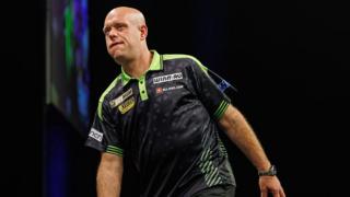 Michael van Gerwen looking frustrated figure during his loss to Luke Humphries