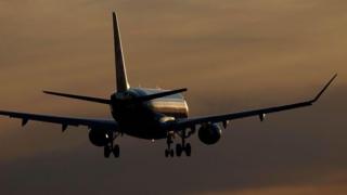 Delta pilot makes 'aggressive manoeuvre' to avoid collision with military aircraft