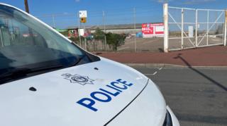 A marked police van parked near the seafront in Great Yarmouth.