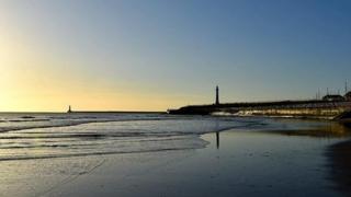 Calm seas and clear skies at Roker in Sunderland.