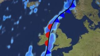 Map of the UK with a waving weather front passing over Wales